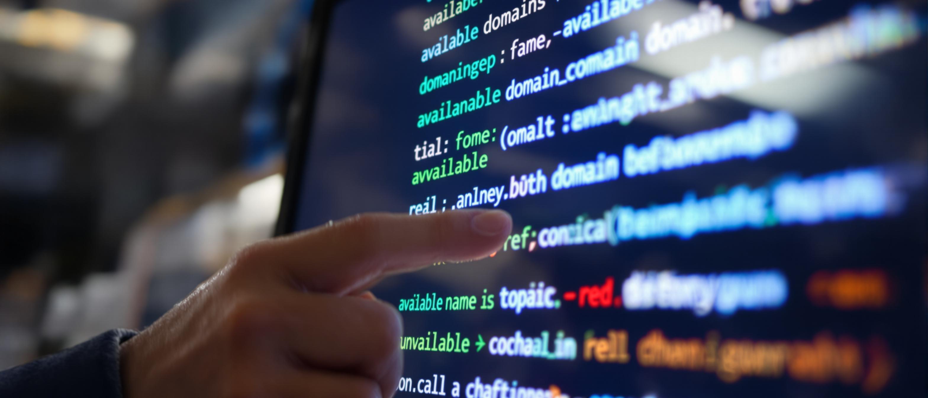 A focused view of a computer screen presenting domain name choices distinguished by color-coded availability status.